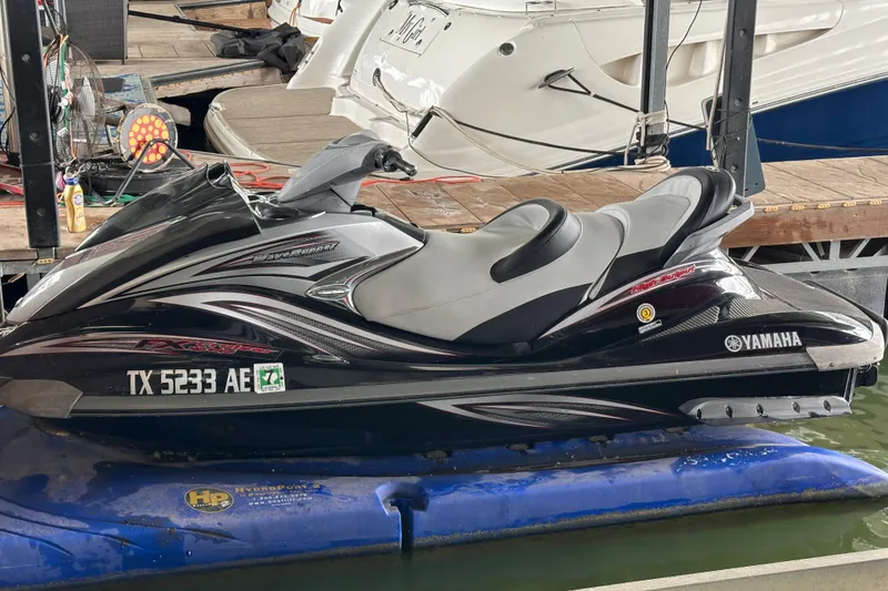 Slide: The Image of 2006 Yamaha WaveRunner FX Cruiser HO jet ski docked at marina. - 3
