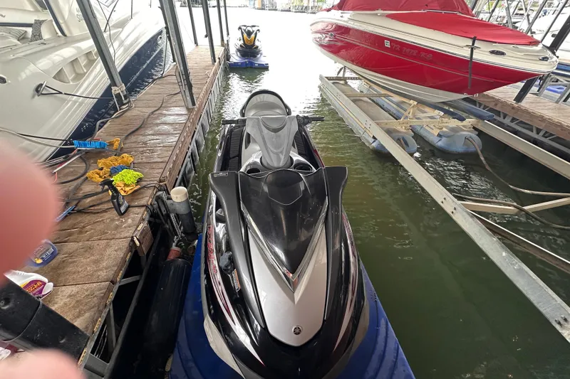 Slide: The Image of 2006 Yamaha WaveRunner FX Cruiser HO docked beside boats in marina. - 6