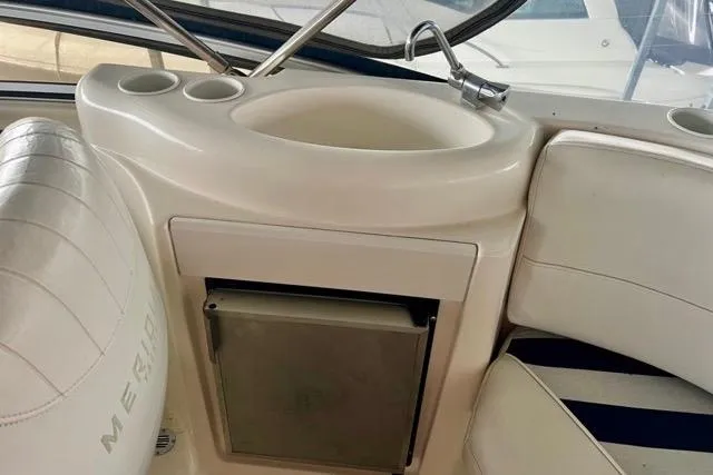 Slide: The Image of 2007 Meridian 368 Motoryacht interior with sink and seating area. - 13