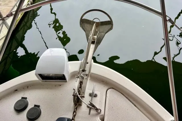 Slide: The Image of Bow view of 2007 Meridian 368 Motoryacht with anchor and water reflection. - 15