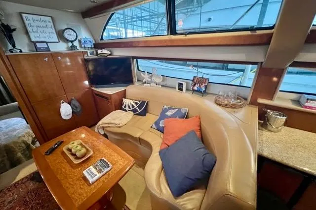 Slide: The Image of Luxurious interior of a 2007 Meridian 368 Motoryacht with cozy seating and elegant decor. - 17