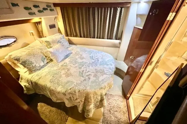 Slide: The Image of Luxurious bedroom in 2007 Meridian 368 Motoryacht with cozy bedding and elegant decor. - 24