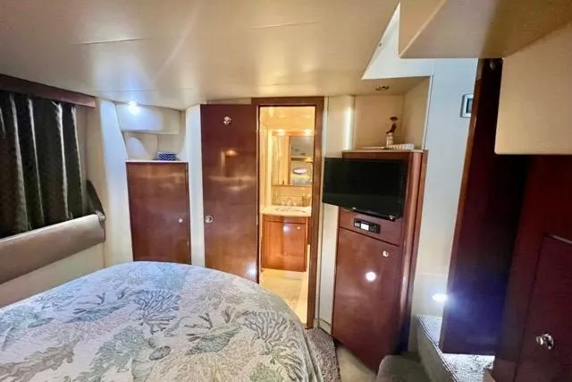 Slide: The Image of Interior of 2007 Meridian 368 Motoryacht with cozy bedroom and ensuite bathroom. - 27