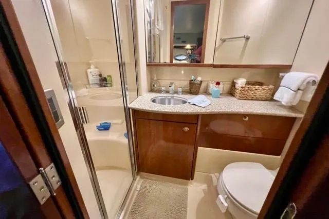 Slide: The Image of Luxurious bathroom in 2007 Meridian 368 Motoryacht with modern amenities and elegant design. - 29