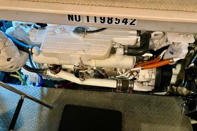 Slide: The Image of Engine compartment of 2007 Meridian 368 Motoryacht, showcasing mechanical components and serial number. - 31