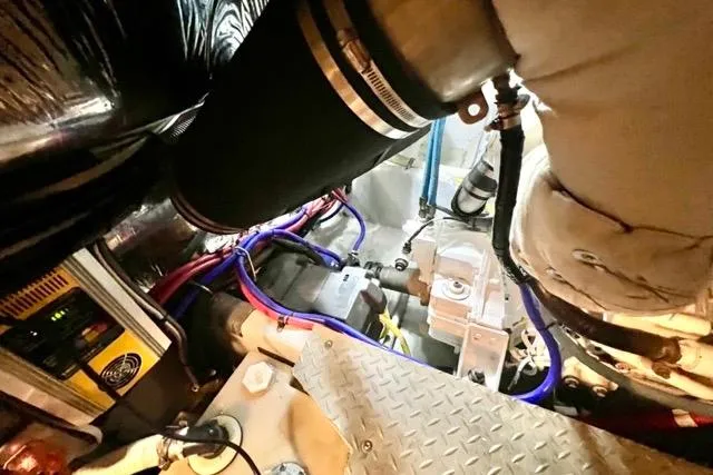 Slide: The Image of Engine room of 2007 Meridian 368 Motoryacht with visible wiring and components. - 37