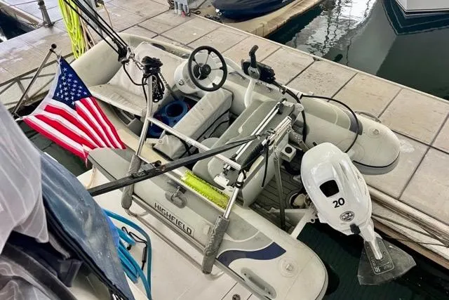 Slide: The Image of Inflatable boat with American flag docked near 2007 Meridian 368 Motoryacht. - 38