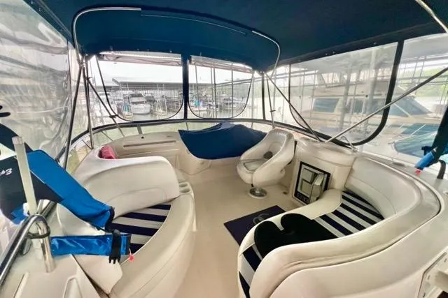 Slide: The Image of Luxurious interior of 2007 Meridian 368 Motoryacht with plush seating and panoramic windows. - 7