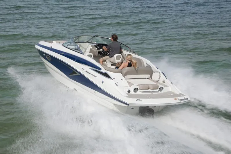 Slide: The Image of Manufacturer Provided Image: 2026 Crownline Eclipse E255 speedboat cruising on open water, showcasing sleek design and performance. - 4