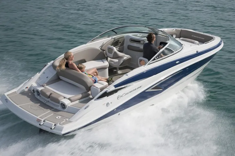 Slide: The Image of Manufacturer Provided Image: 2026 Crownline Eclipse E255 boat cruising on open water with passengers. - 5