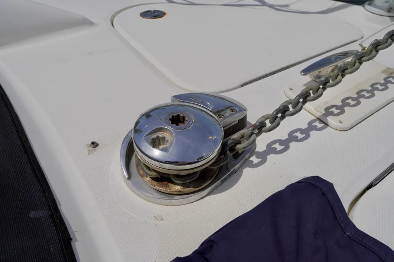 Slide: The Image of Anchor windlass on 2006 Sea Ray 40 Motor Yacht deck with chain. - 24
