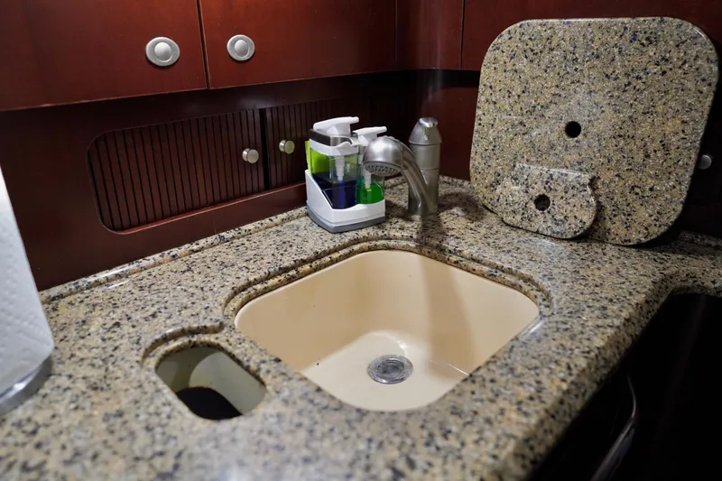 Slide: The Image of Granite countertop with sink in 2006 Sea Ray 40 Motor Yacht kitchen area. - 42