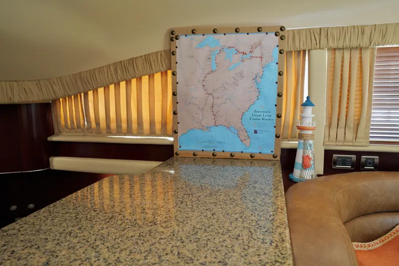 Slide: The Image of Interior of 2006 Sea Ray 40 Motor Yacht with map and lighthouse decor. - 43