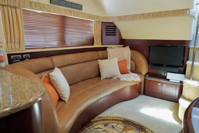 Slide: The Image of Luxurious interior of 2006 Sea Ray 40 Motor Yacht with leather seating and entertainment area. - 44