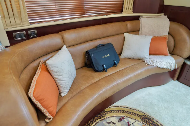 Slide: The Image of Luxurious interior of 2006 Sea Ray 40 Motor Yacht with leather seating and decorative pillows. - 45