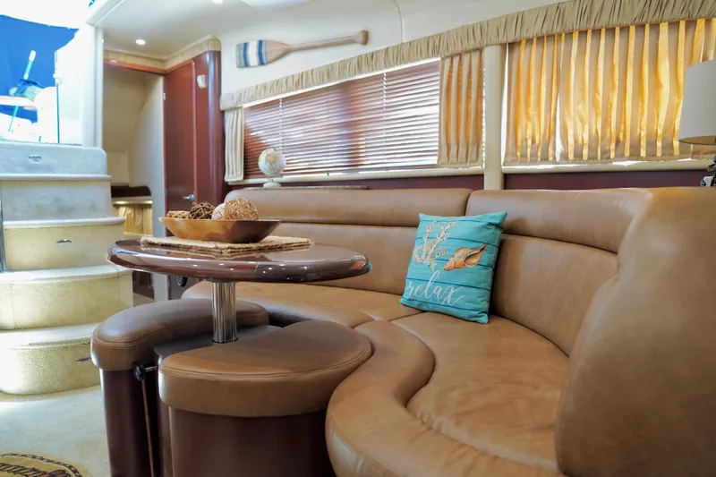 Slide: The Image of Luxurious interior of 2006 Sea Ray 40 Motor Yacht with plush seating and elegant decor. - 47
