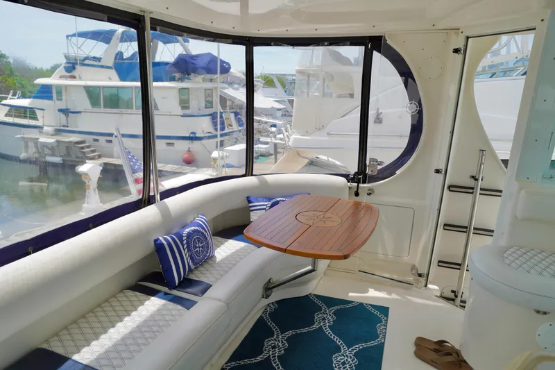 Slide: The Image of Interior of a 2006 Sea Ray 40 Motor Yacht with elegant seating and nautical decor. - 5