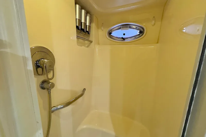Slide: The Image of Shower area in 2006 Sea Ray 40 Motor Yacht with porthole and dispensers. - 59