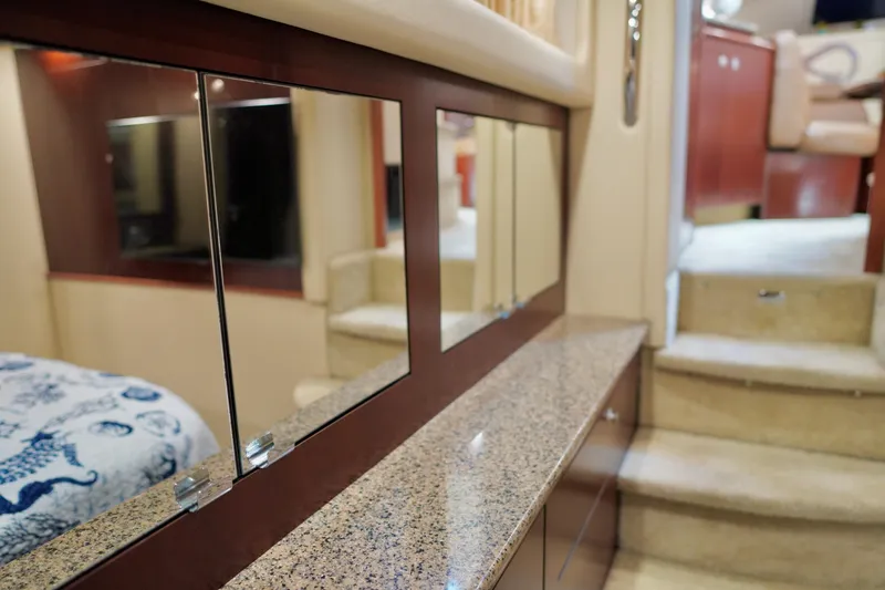Slide: The Image of Interior of 2006 Sea Ray 40 Motor Yacht with elegant wood and granite finishes. - 60