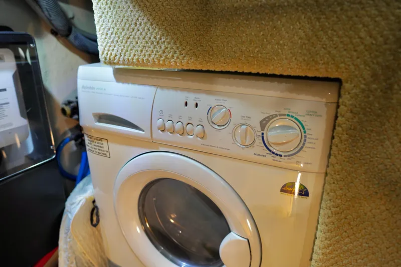 Slide: The Image of Washing machine inside 2006 Sea Ray 40 Motor Yacht, featuring various settings and controls. - 65