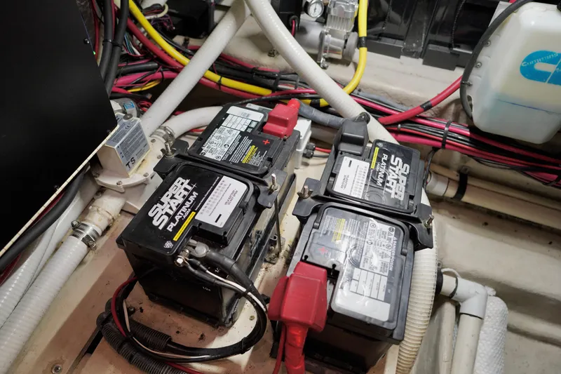 Slide: The Image of Engine room of 2006 Sea Ray 40 Motor Yacht with batteries and wiring. - 66