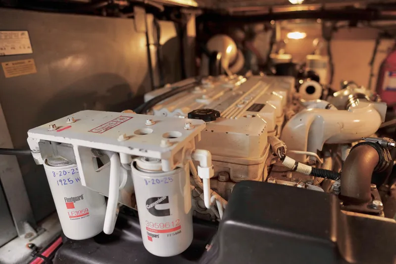 Slide: The Image of Engine room of a 2006 Sea Ray 40 Motor Yacht, showcasing detailed components. - 68