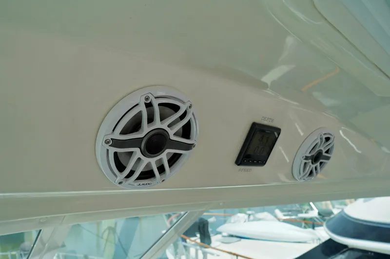 Slide: The Image of 2006 Sea Ray 40 Motor Yacht interior with JL Audio speakers and depth gauge. - 7