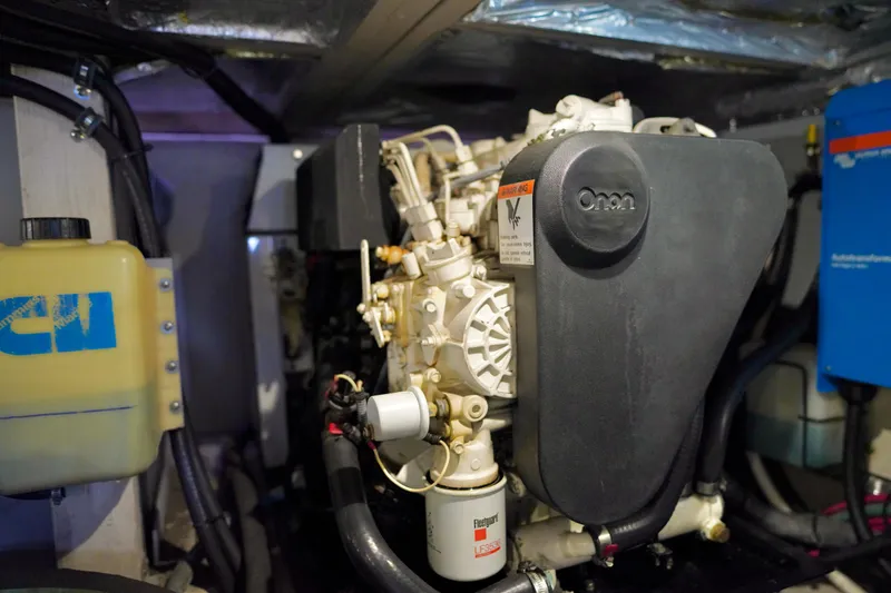 Slide: The Image of Engine room of a 2006 Sea Ray 40 Motor Yacht featuring Onan generator. - 79