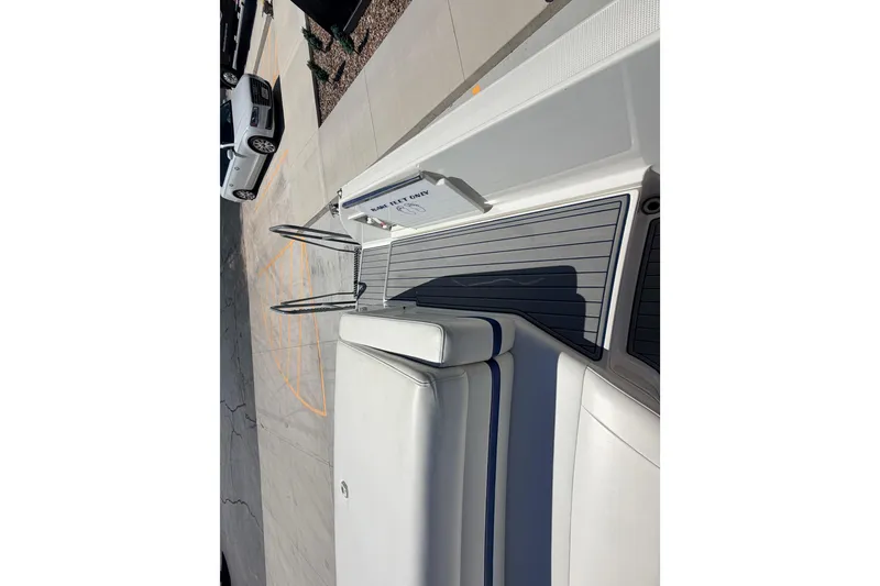 Slide: The Image of 2002 Formula 330 Sun Sport boat deck with seating and swim platform. - 15
