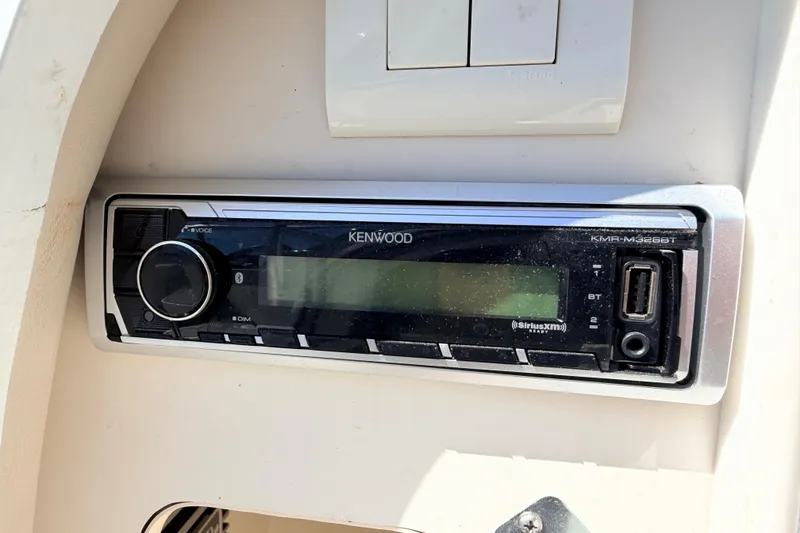 Slide: The Image of Kenwood stereo system in a 2002 Formula 330 Sun Sport boat dashboard. - 41