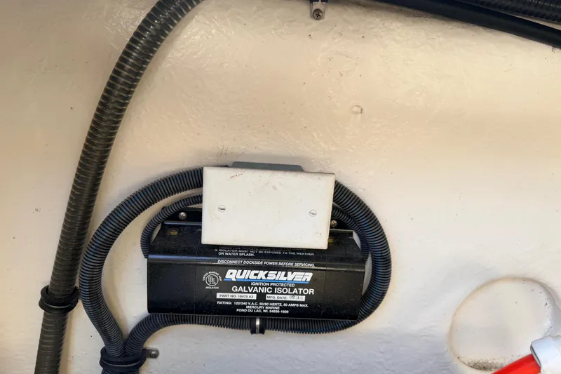 Slide: The Image of Quicksilver galvanic isolator in a 2002 Formula 330 Sun Sport boat. - 49