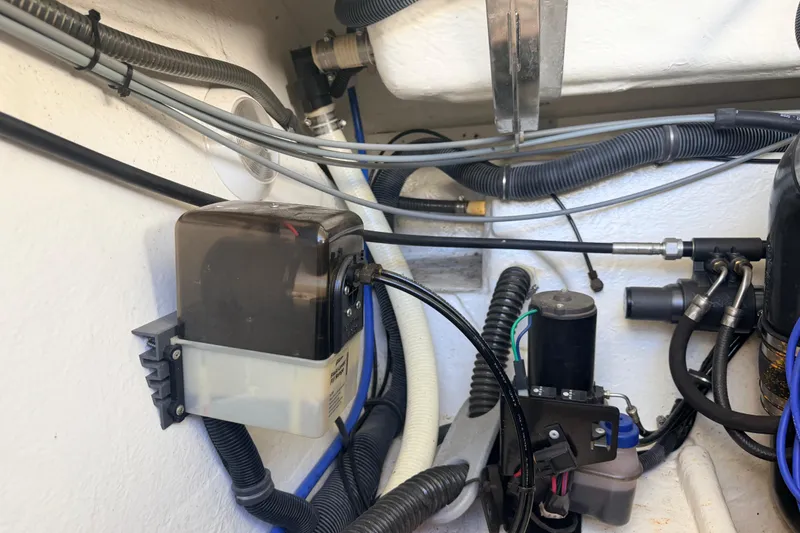 Slide: The Image of Engine compartment of a 2002 Formula 330 Sun Sport boat, showing wiring and components. - 50
