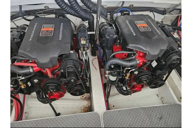Slide: The Image of Twin Volvo Penta engines in a 2002 Formula 330 Sun Sport boat. - 52