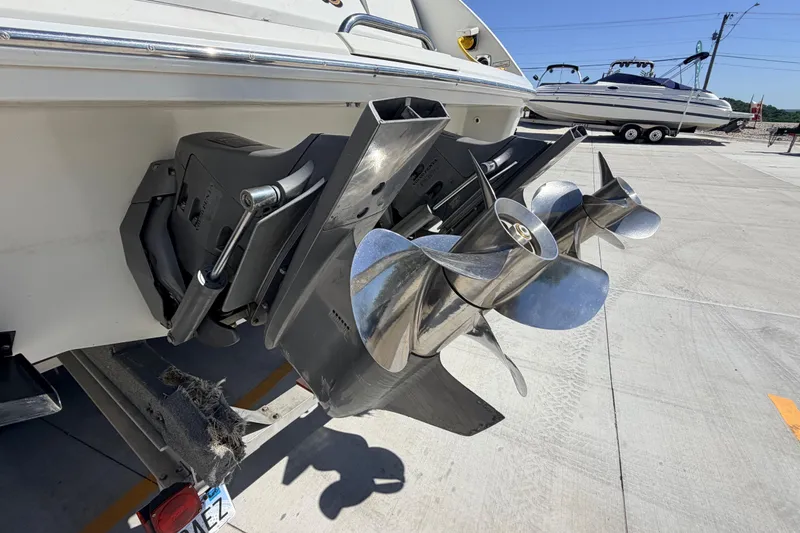 Slide: The Image of Rear view of a 2002 Formula 330 Sun Sport boat with dual propellers. - 8