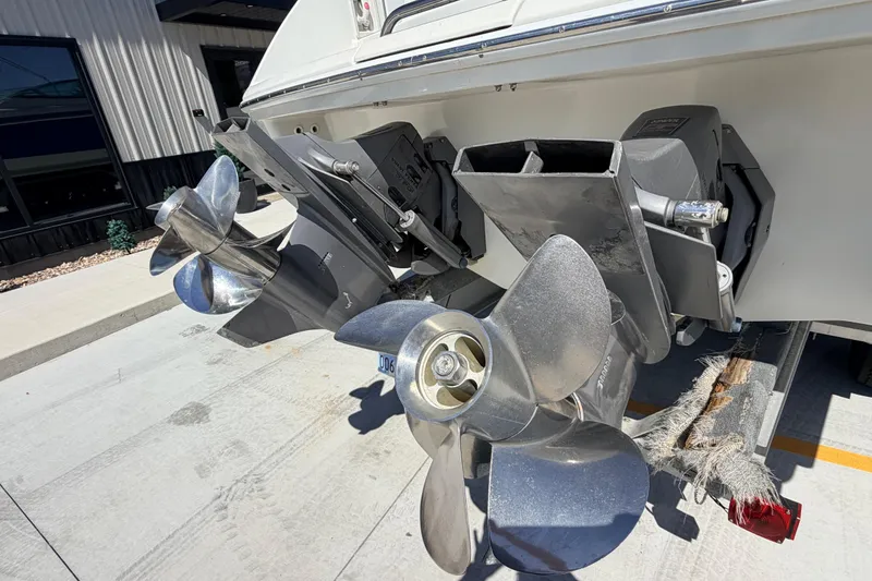 Slide: The Image of Rear view of 2002 Formula 330 Sun Sport boat with dual propellers. - 9