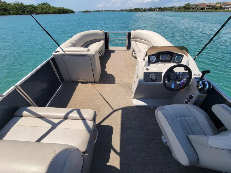 Slide: The Image of Cypress Cay 232 Seabreeze 2020 pontoon boat on calm water. - 4