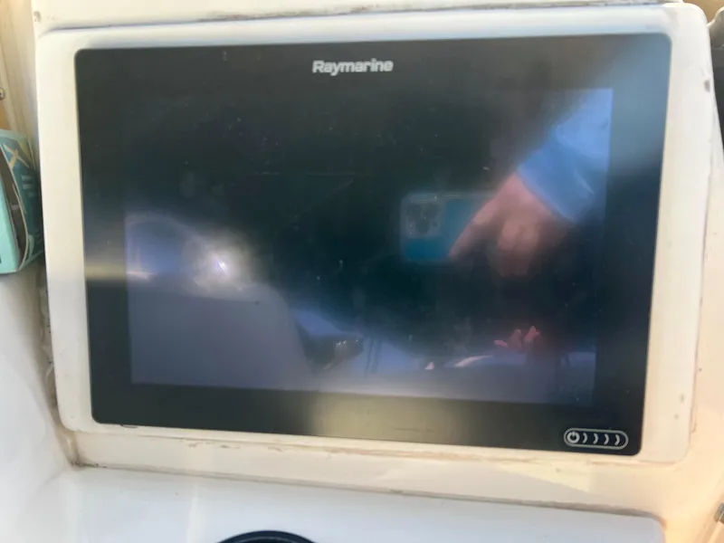 Slide: The Image of Raymarine display on 2003 Silverton 43 Motor Yacht dashboard. - 14