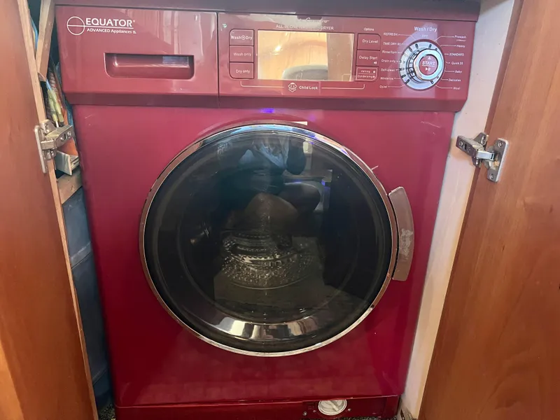 Slide: The Image of Red Equator washing machine inside 2003 Silverton 43 Motor Yacht cabinet. - 34