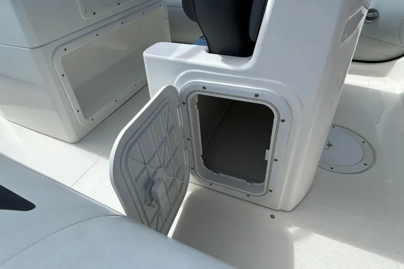 Slide: The Image of Open storage compartment on 2016 Brig Navigator 520 boat deck. - 11