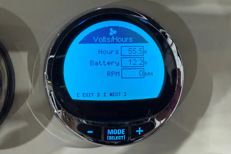 Slide: The Image of Digital display showing volts, hours, battery voltage, and RPM on Parker 2100 Special Edition. - 23