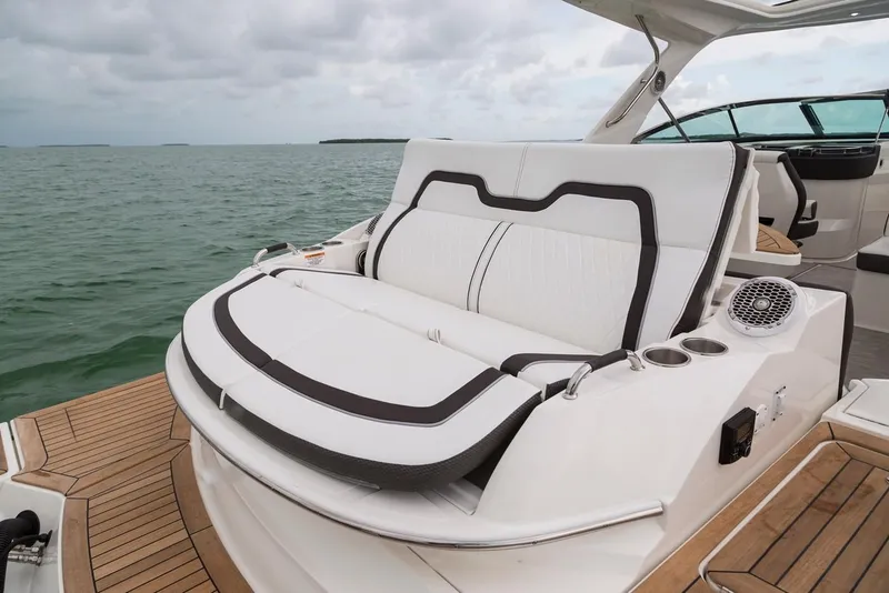 Slide: The Image of Manufacturer Provided Image: 2019 Sea Ray SLX 350 OB boat with luxurious seating on deck. - 15