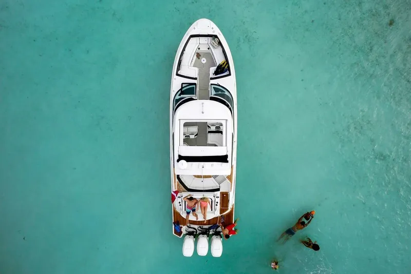 Slide: The Image of Manufacturer Provided Image: Aerial view of 2019 Sea Ray SLX 350 OB boat in clear turquoise water. - 6