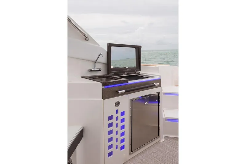 Slide: The Image of Manufacturer Provided Image: Outdoor kitchen on 2019 Sea Ray SLX 350 OB boat with ocean view. - 18