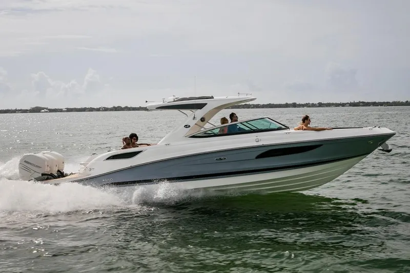 Slide: The Image of Manufacturer Provided Image: 2019 Sea Ray SLX 350 OB cruising on open water. - 2