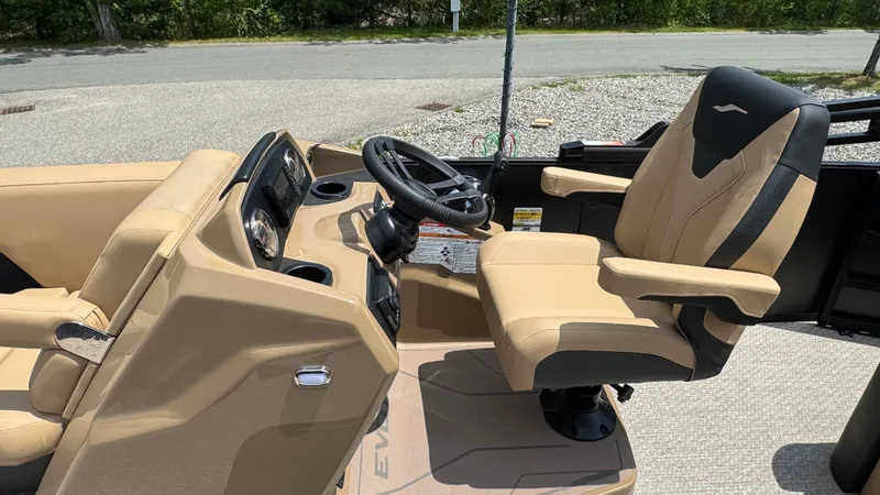 Slide: The Image of Evotti 521CS 2026 boat helm with beige seat and steering wheel. - 11