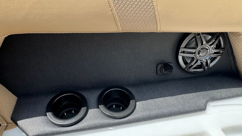 Slide: The Image of Evotti 521CS 2026 interior with speaker and cup holders. - 20