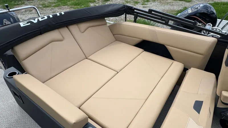 Slide: The Image of Evotti 521CS 2026 boat with beige lounge seating. - 26