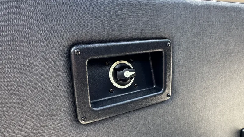 Slide: The Image of Evotti 521CS 2026 interior with black control panel. - 27