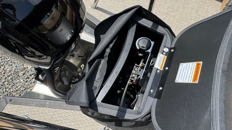 Slide: The Image of Evotti 521CS 2026 engine cover with warning label. - 28