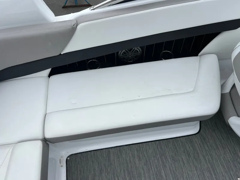 Slide: The Image of Interior of Four Winns H260 boat, white upholstery, 2022 model. - 10